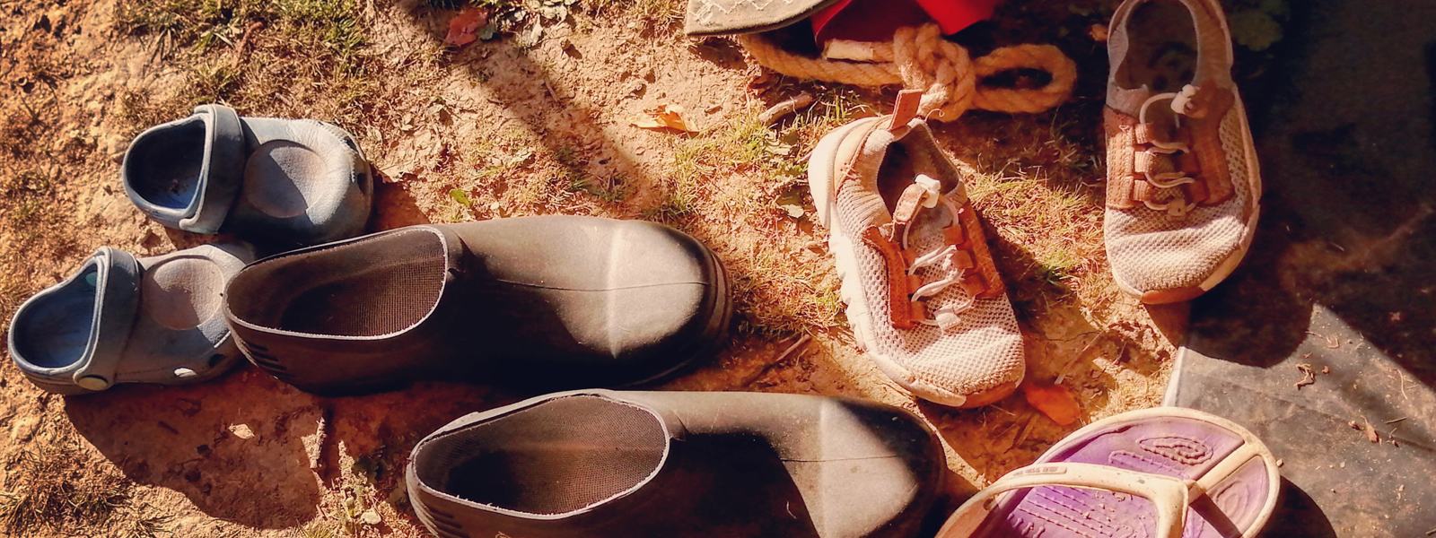 adult and child shoes outside a meditation space